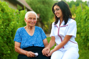 skilled nurse and elderly woman